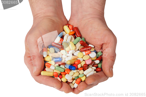 Image of Hands with pills