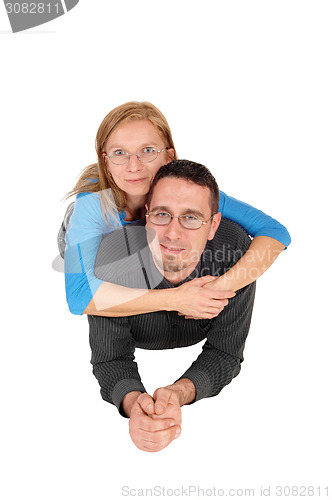 Image of Couple lying on floor.