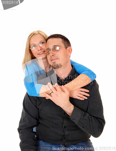 Image of Young couple hugging.