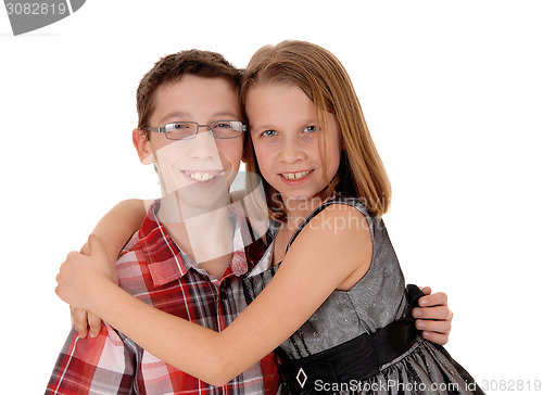Image of Brother and sister hugging.