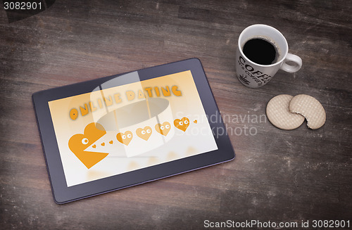 Image of Online dating on a tablet