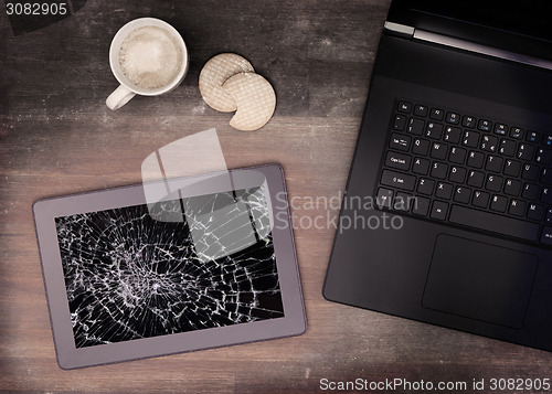 Image of Tablet computer with broken glass