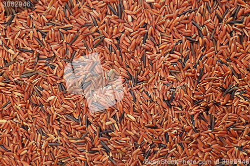 Image of Camargue red rice grains background 