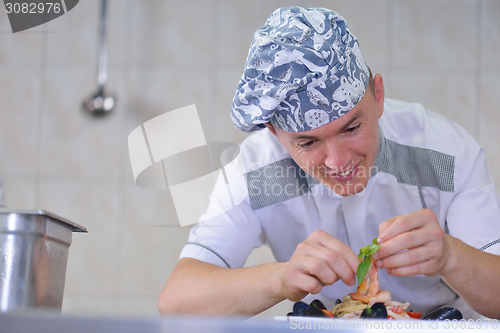 Image of chef preparing food