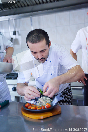 Image of chef preparing food