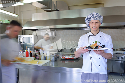 Image of chef preparing food