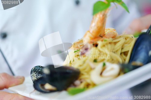 Image of chef preparing food