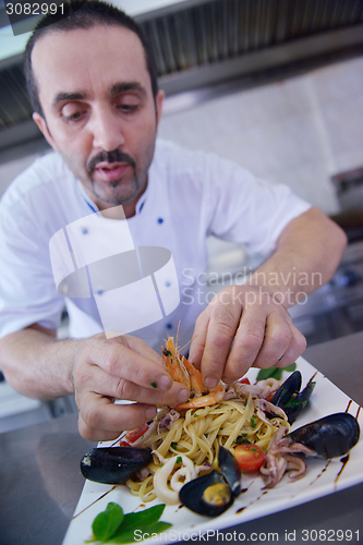 Image of chef preparing food