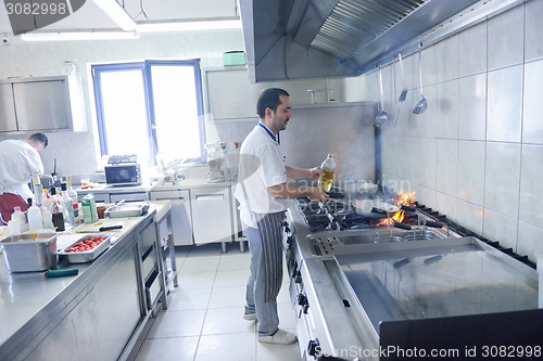 Image of chef preparing food