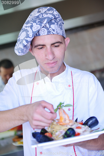 Image of chef preparing food