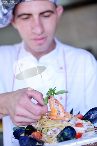 Image of chef preparing food