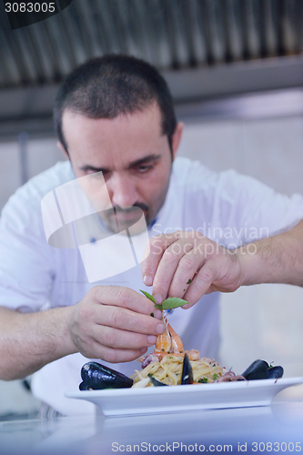 Image of chef preparing food