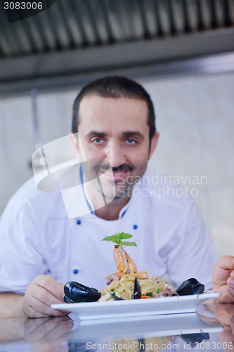 Image of chef preparing food