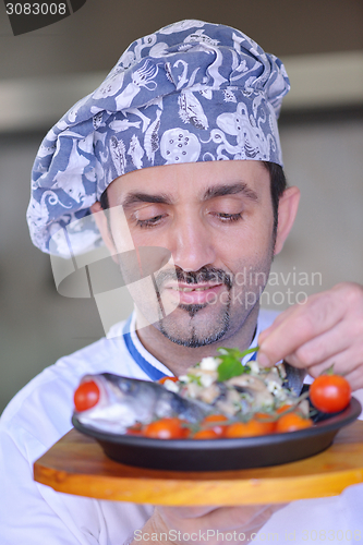 Image of chef preparing food