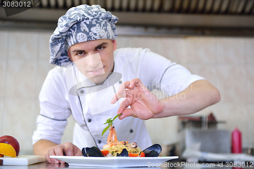 Image of chef preparing food