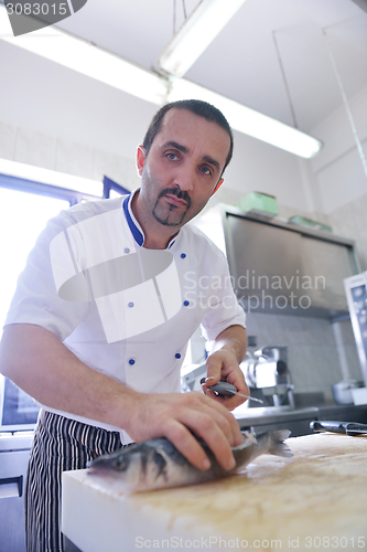 Image of chef preparing food