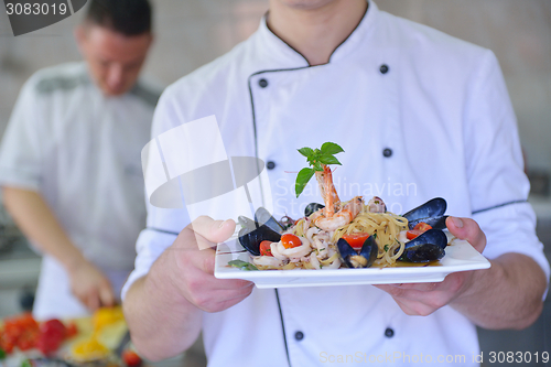 Image of chef preparing food