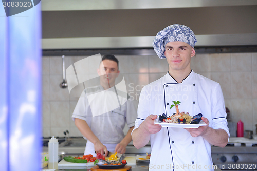 Image of chef preparing food