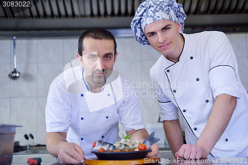 Image of chef preparing food