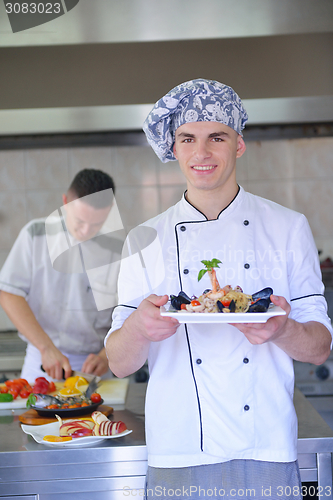 Image of chef preparing food