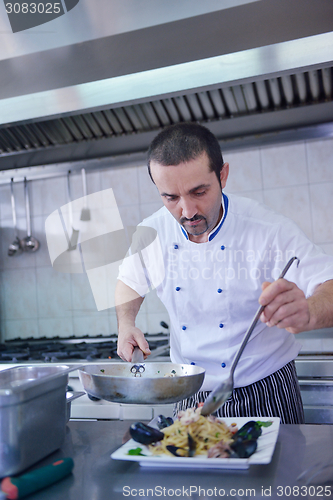 Image of chef preparing food