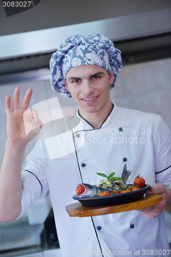 Image of chef preparing food