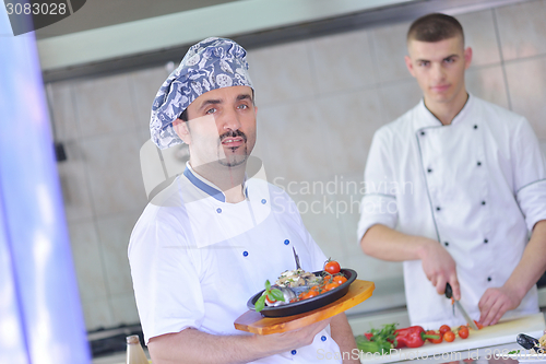 Image of chef preparing food