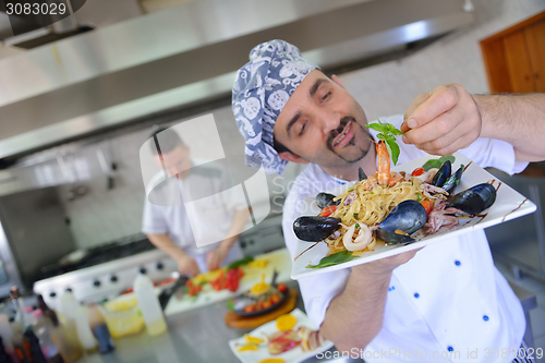 Image of chef preparing food