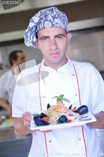 Image of chef preparing food