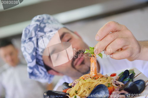 Image of chef preparing food