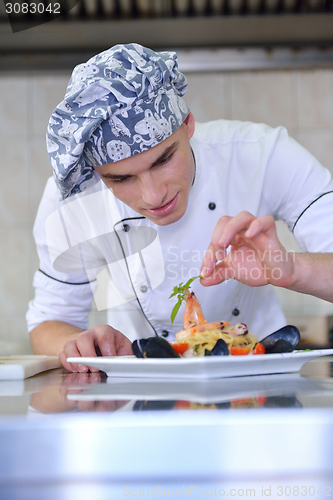 Image of chef preparing food