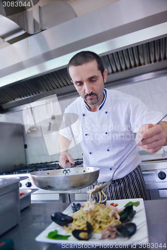 Image of chef preparing food