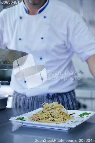 Image of chef preparing food