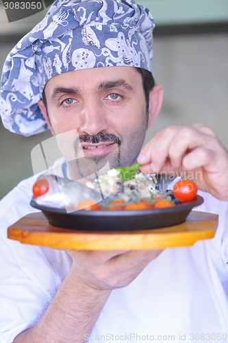 Image of chef preparing food