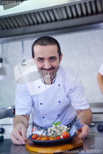 Image of chef preparing food