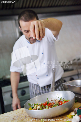 Image of chef preparing food