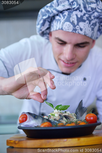 Image of chef preparing food