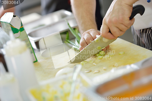 Image of chef preparing food