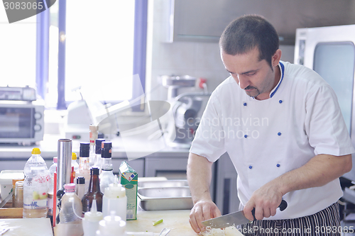 Image of chef preparing food