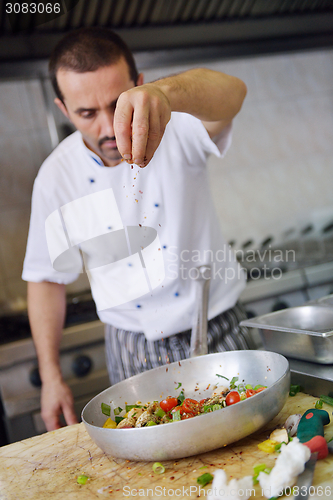 Image of chef preparing food