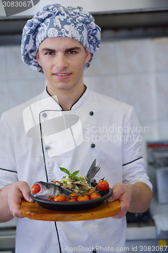 Image of chef preparing food