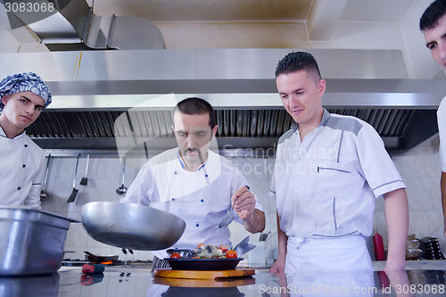 Image of chef preparing food