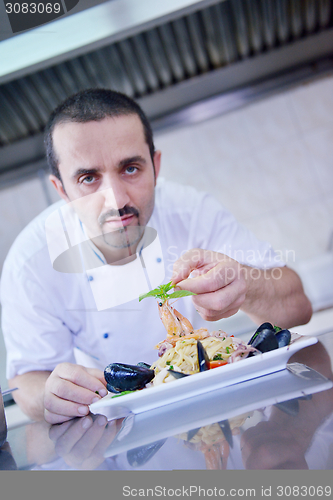 Image of chef preparing food