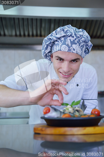 Image of chef preparing food