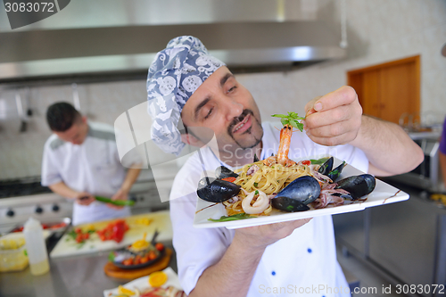 Image of chef preparing food