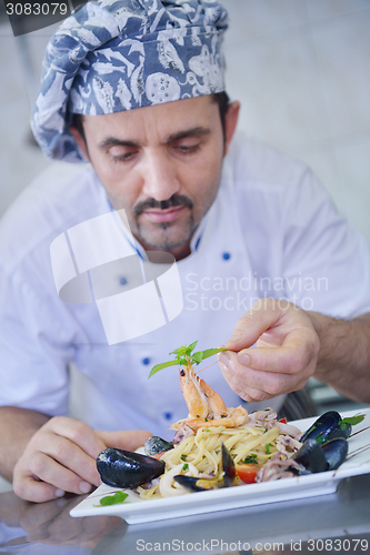 Image of chef preparing food