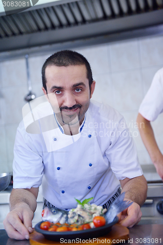 Image of chef preparing food