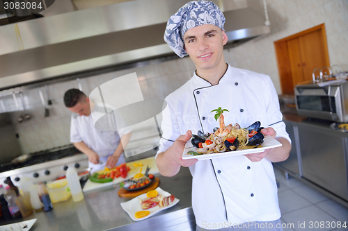 Image of chef preparing food