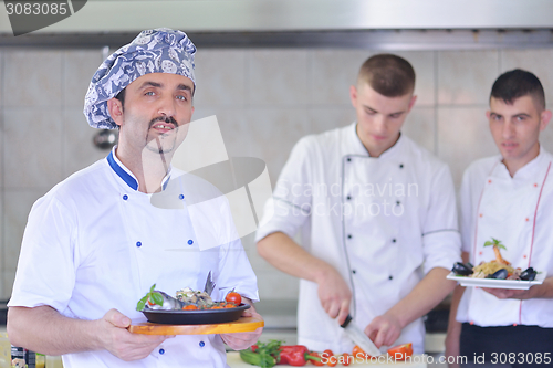 Image of chef preparing food