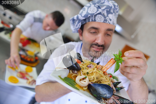 Image of chef preparing food